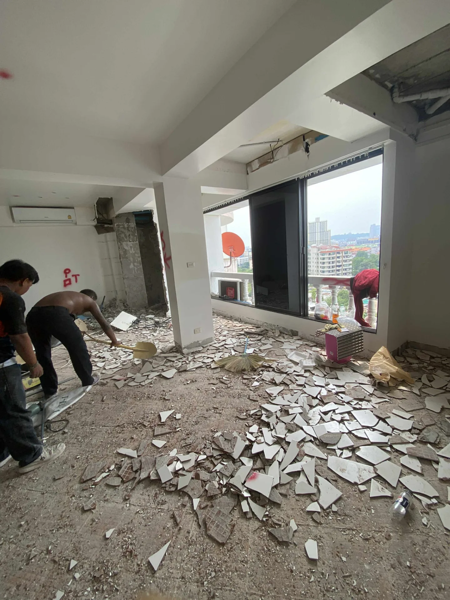 Renovation team painting a Pattaya apartment
